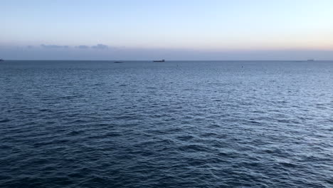 sunset on the ocean horizon on a breezy evening