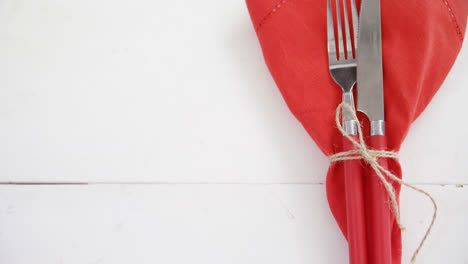 Various-cutlery-on-wooden-table-4k