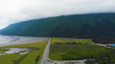 4K-Cinematic-Drone-Video-of-Mountains-Surrounding-Turnagain-Arm-Bay-Looking-Over-Seward-Highway-Alaska-Route-1-at-Glacier-Creek-Near-Anchorage,-AK