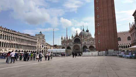 st. mark's square in venice with historic landmarks and tourists