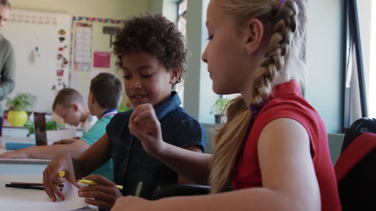 Two girls studying in the class