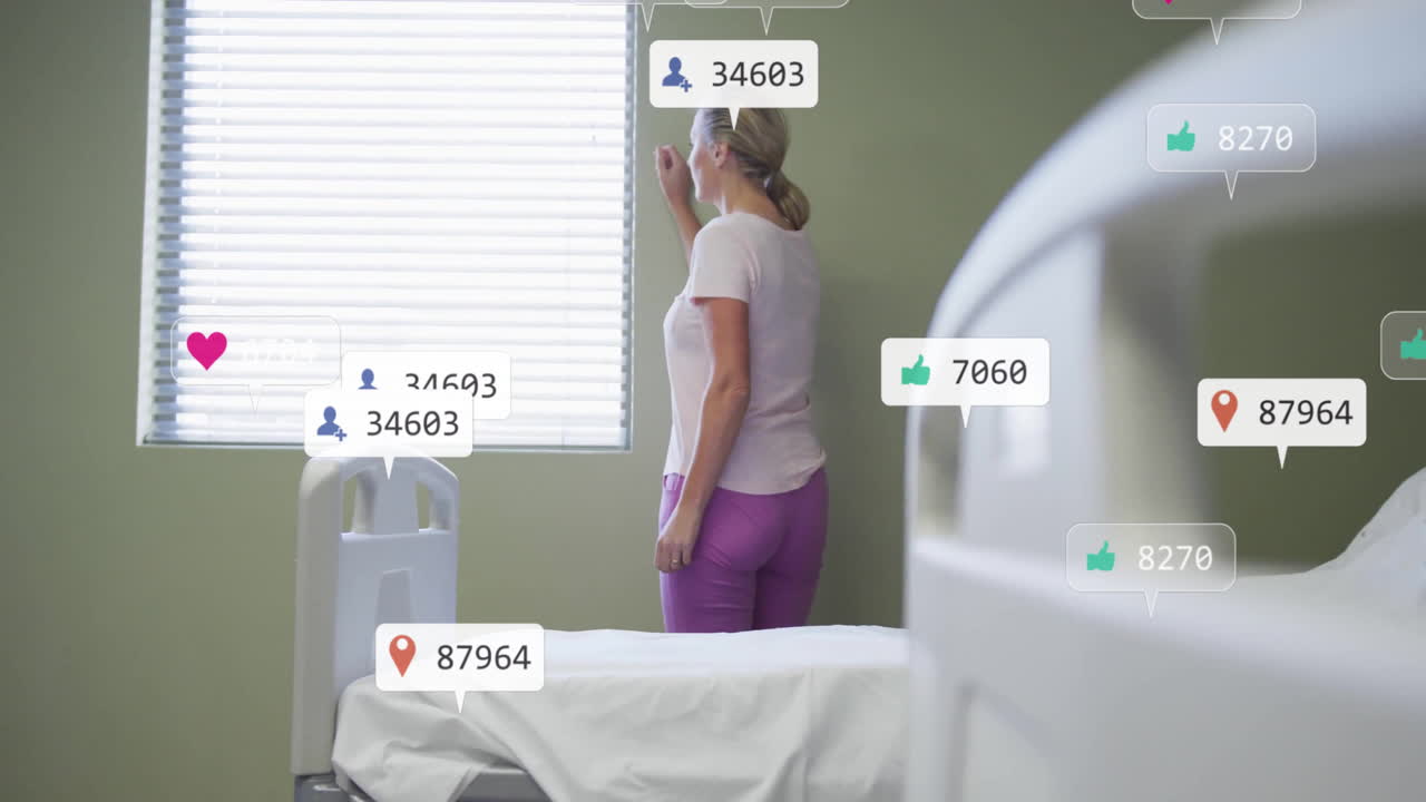 Animation of media icons over caucasian female patient at hospital bed