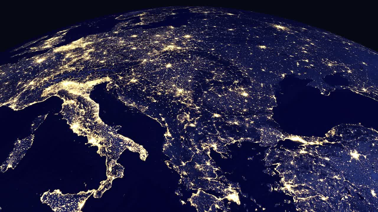 地球が回転し、夜間に輝く都市の明かりとともにバルカン半島地域にズームインする