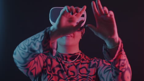 person wearing vr headset with neon lighting
