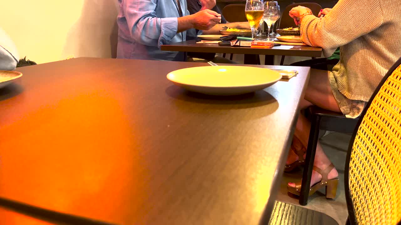 Adventurous friends savoring Lisbon's traditional delights, including rotten eggs, beer and wine