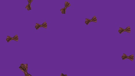 Animation-of-bow-ties-falling-over-purple-background