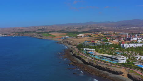 aerial view of the north coast, gran canaria, canary islands, spain, europe. wide drone view with mountains in the distance, sea, palms, seashore