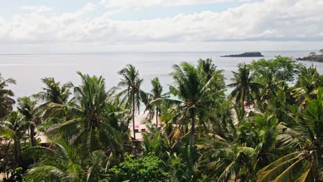 drone scene revealing beautiful virgin beach in east bali, karangasem, indonesia