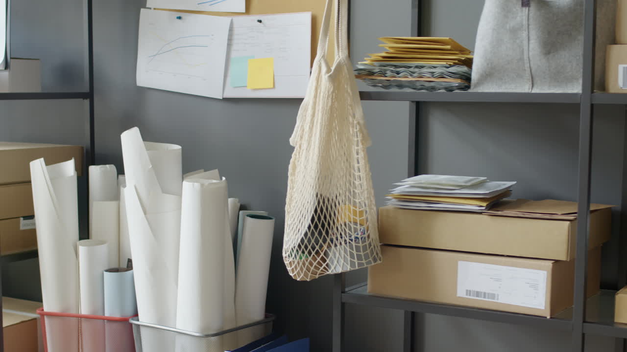 Office storage shelf with boxes and mesh bag