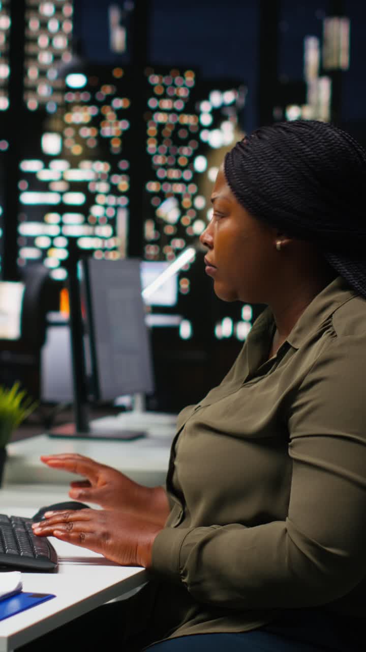 Vertical Video Woman video creator working on editing a movie montage project