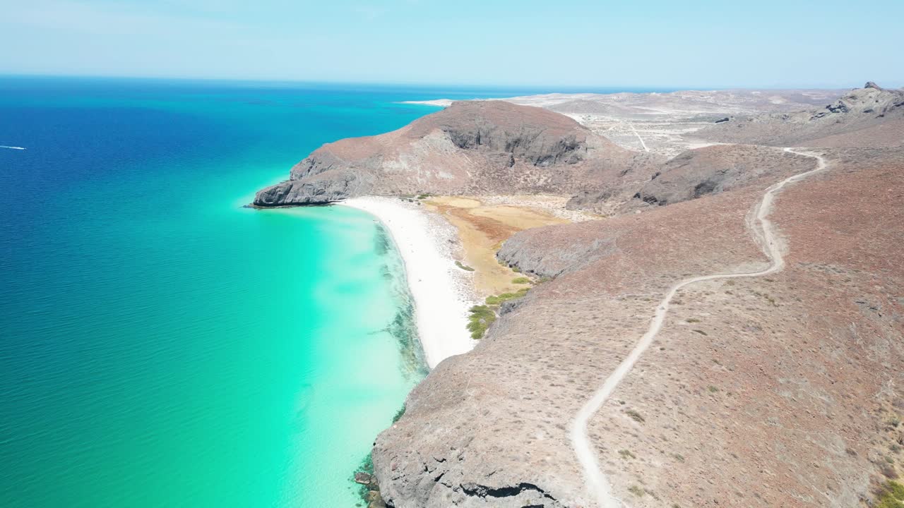 Pristine turquoise waters meet a dry desert landscape in La Paz, Mexico