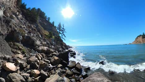 pan over the south beach of arago on a blue sky day