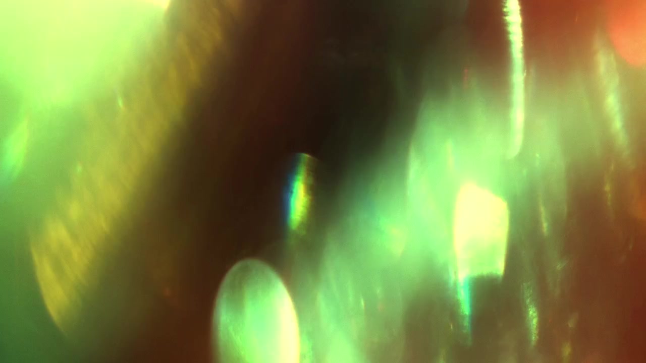 Abstract Light Leaks and Lens Flares in Green and Red