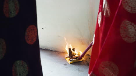 burning joss paper as ritual of offering to ancestors