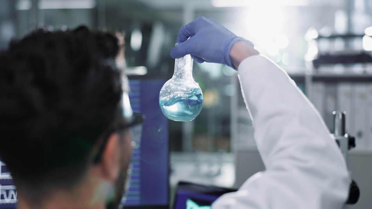 Scientist conducting experiment in lab