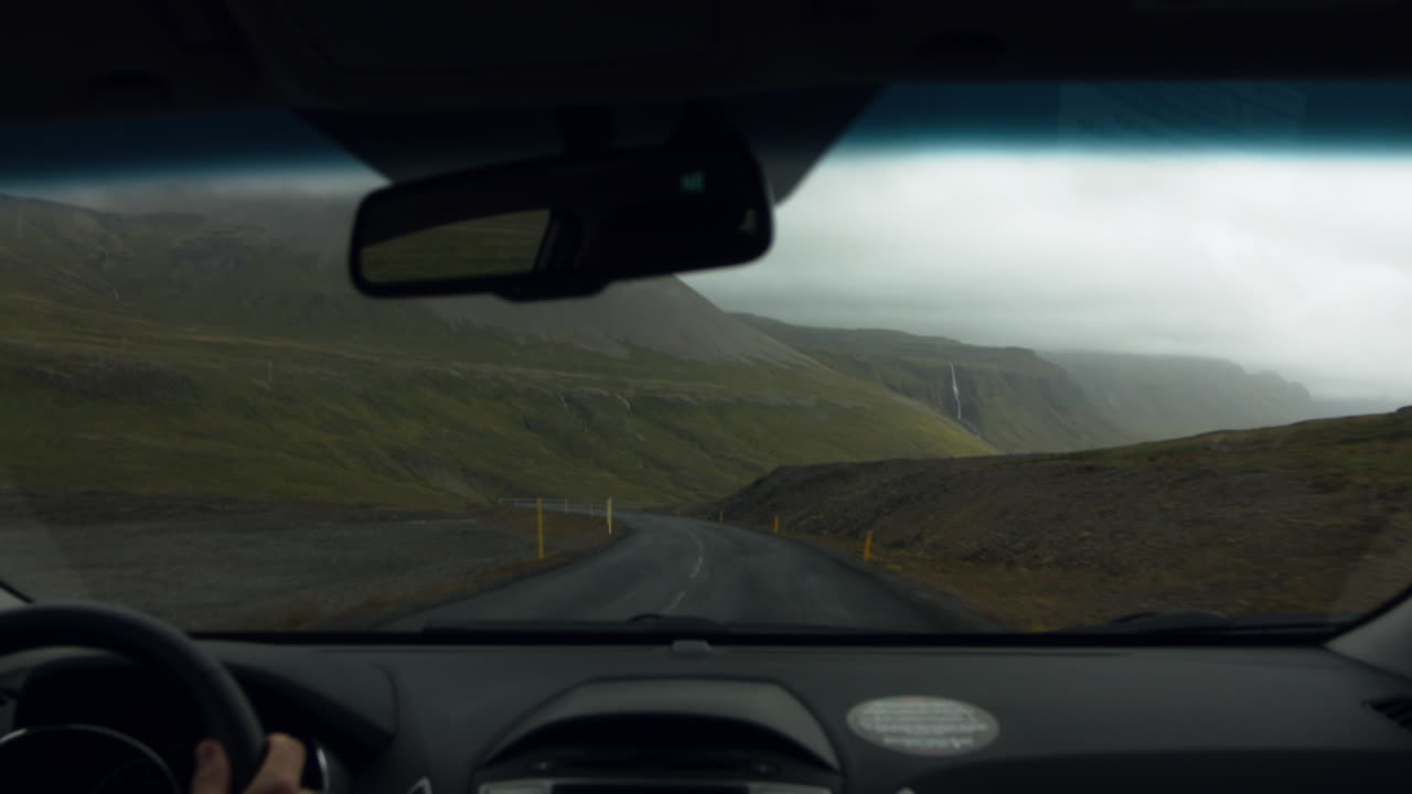 Driving on mountain road in Iceland