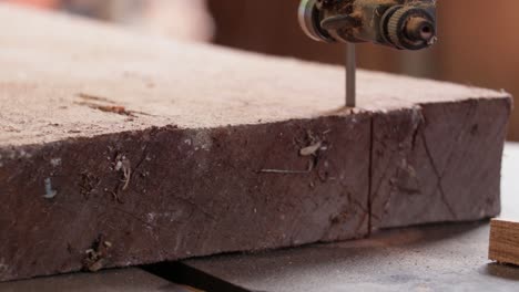 man making a wooden chair