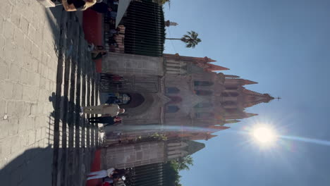 sunny day at parroquia de san miguel arcángel in san miguel de allende, mexico