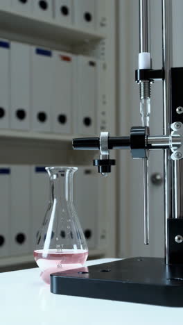 laboratory equipment with flask and liquid