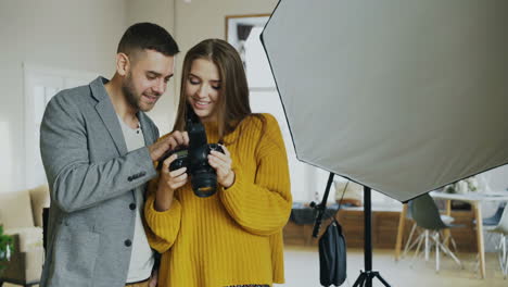 couple learning photography in a photo studio