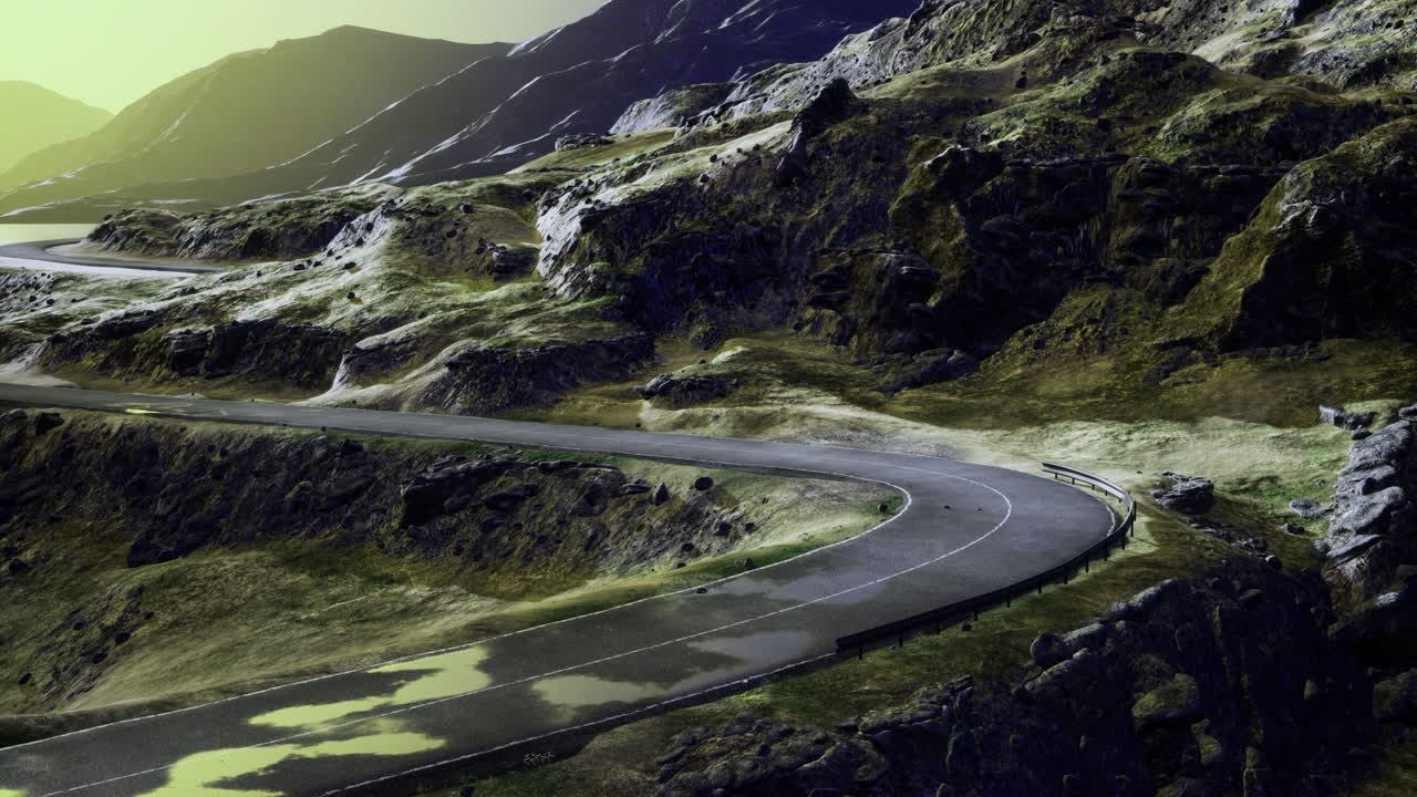 Winding road through rugged mountainscape bathed in golden sunlight
