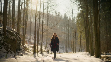 hiker walking on snow path