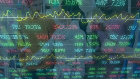 animation of stock market graphs overlaying business people discussing in office
