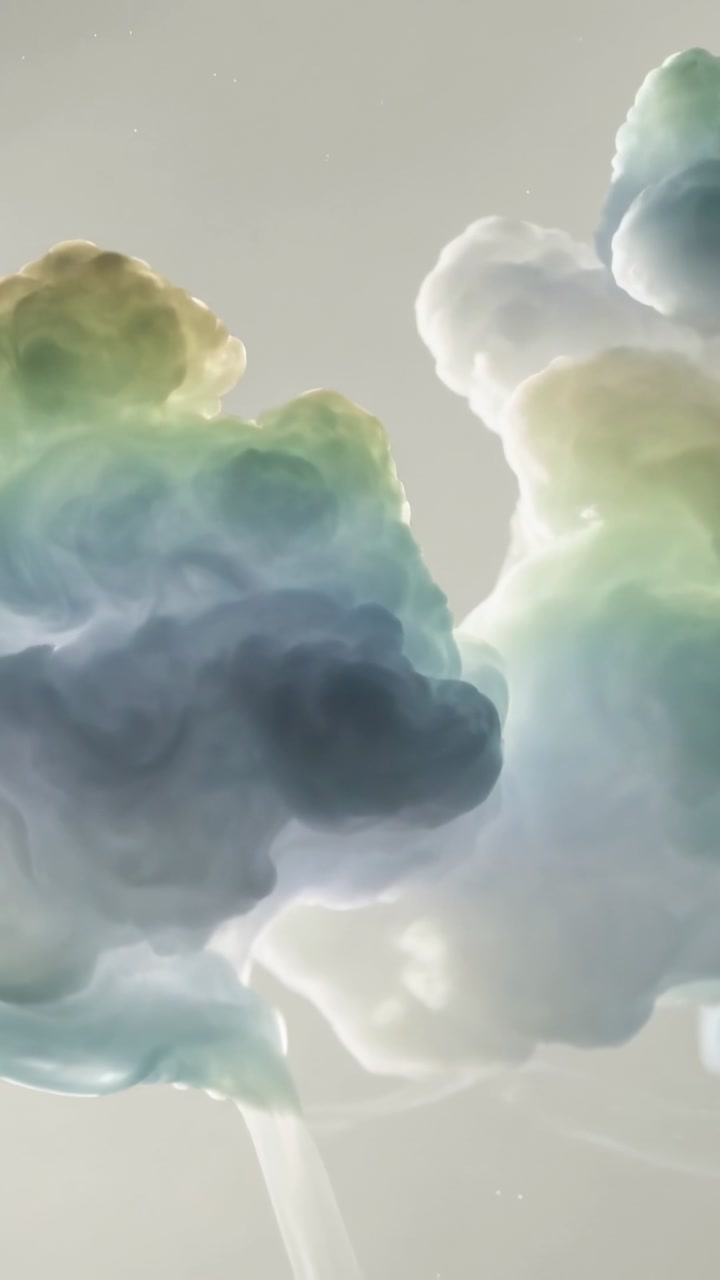 Vertical video: Shifting pastel cloud mass responding to soft breeze in calm sky, extending tendril