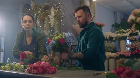 florists creating floral arrangements