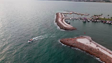 Boat-in-Harbor-in-Old-Town-on-Coast-of-Side,-Turkey,-Aerial