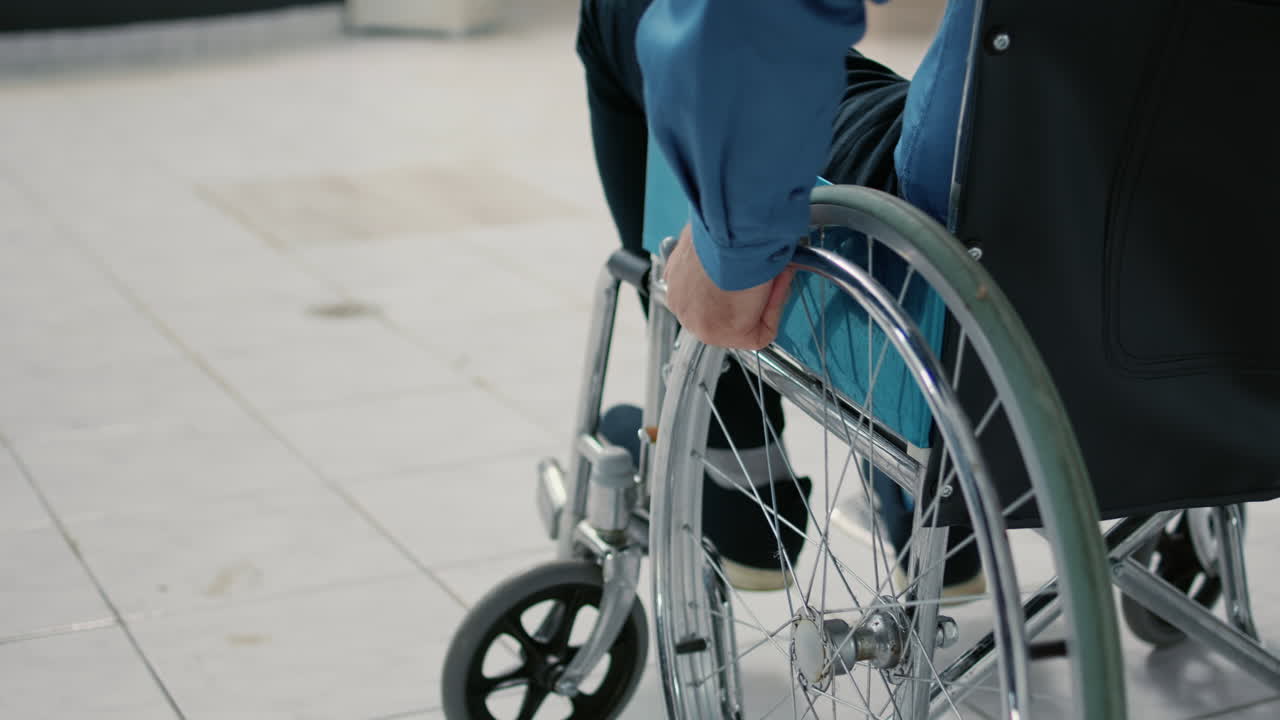 A person using a wheelchair in a medical setting