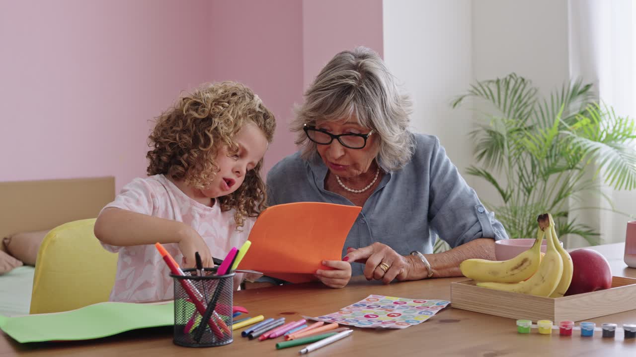 Grandmother and Child Doing Crafts