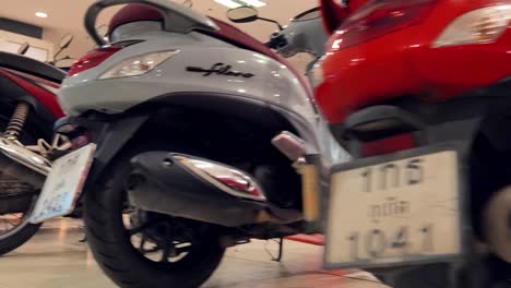 motorcycles parked in a showroom