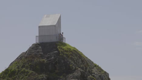 people enjoying the view from the deck