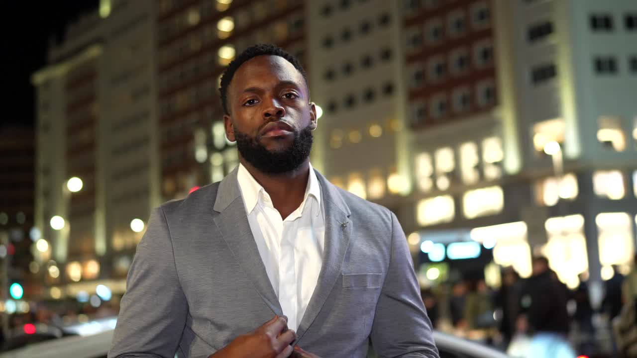 Man in Suit at Night