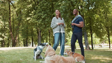 couple with pets oudoors