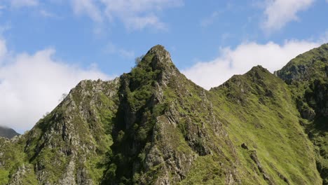 aerial passage over a virgin and wild mountain in the pyrenees, in ariège - france