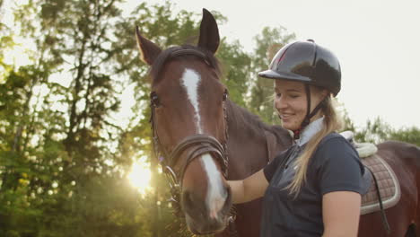 It's-fantastic-moments-with-darling-horse.-Girl-is-stroking-her-brown-horse-when-they-walk-together.-These-are-warm-feelings-and-sincere-smile.