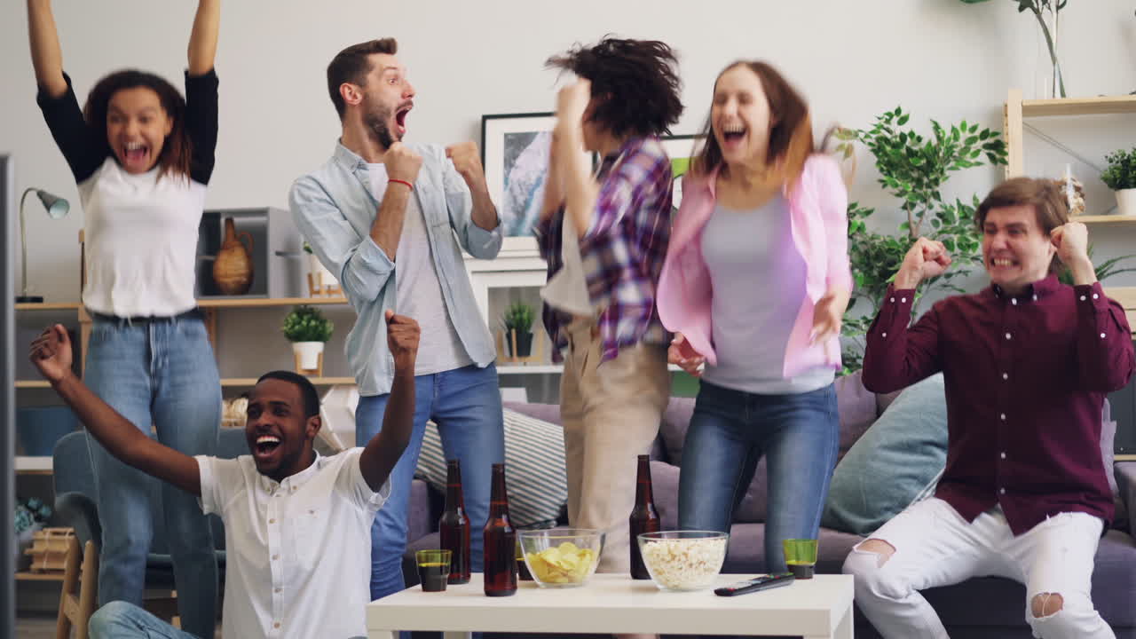 Friends Having a Fun Time Watching a Game