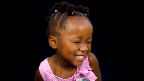 young black girl making silly faces