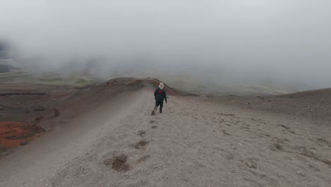 cotopaxi mountain volcano national park descend hike trek low visibility alpine ecuador