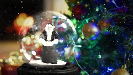 Animation-of-christmas-snow-globe-with-santa-claus-and-christmas-tree