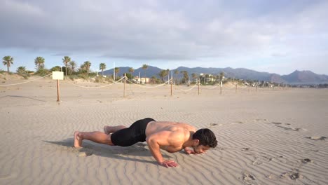 metabolic workout on the beach with lateral push-ups variant