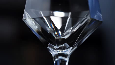 close-up abstract of faceted crystal glass reflecting light