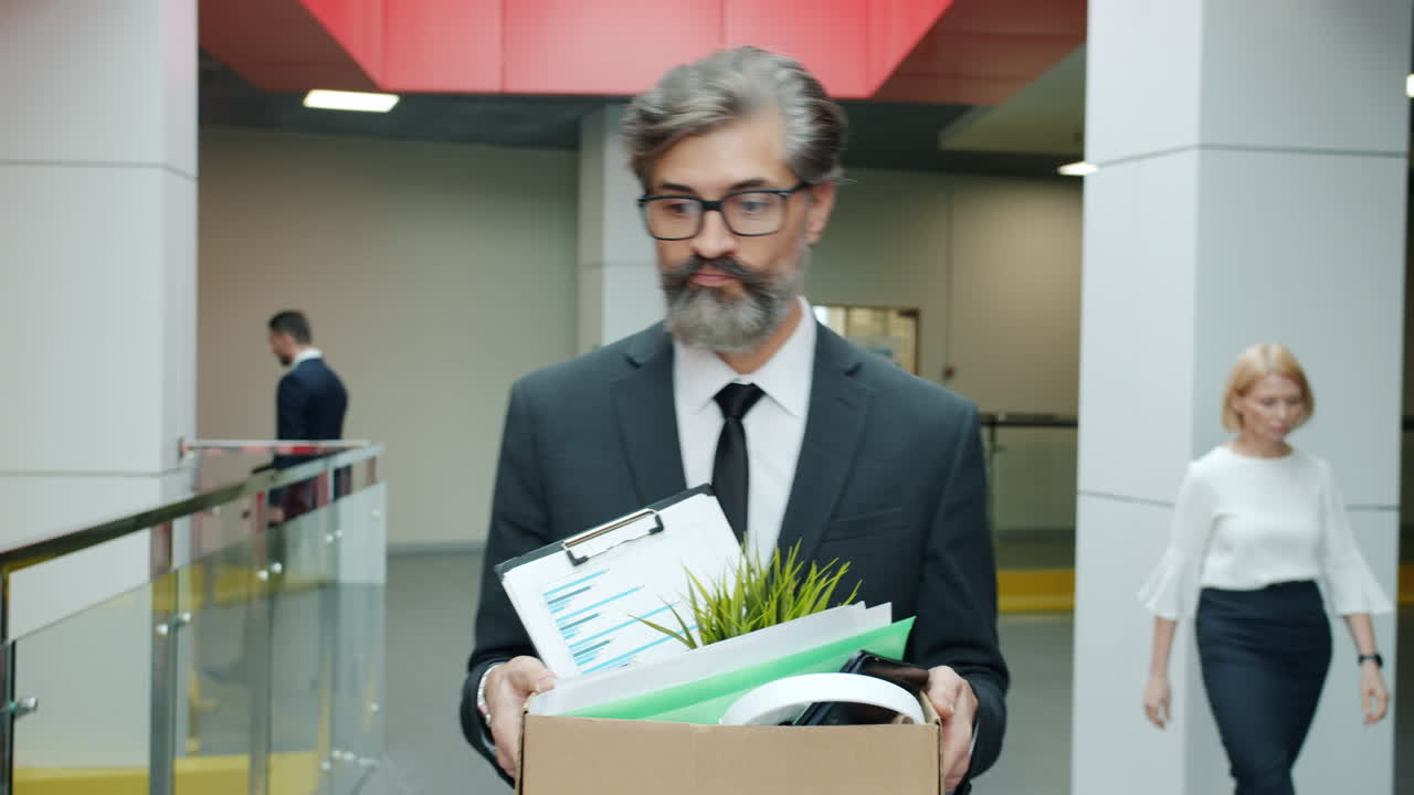 Fired Businessman Leaving the Office