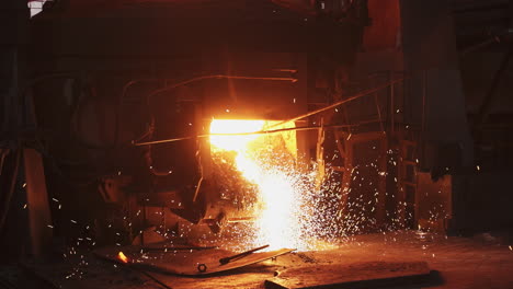 molten metal pouring from a furnace