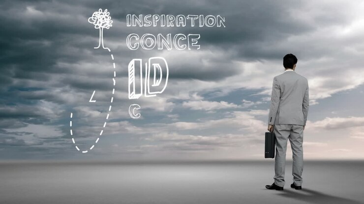 Businessman watching idea concept in the sky