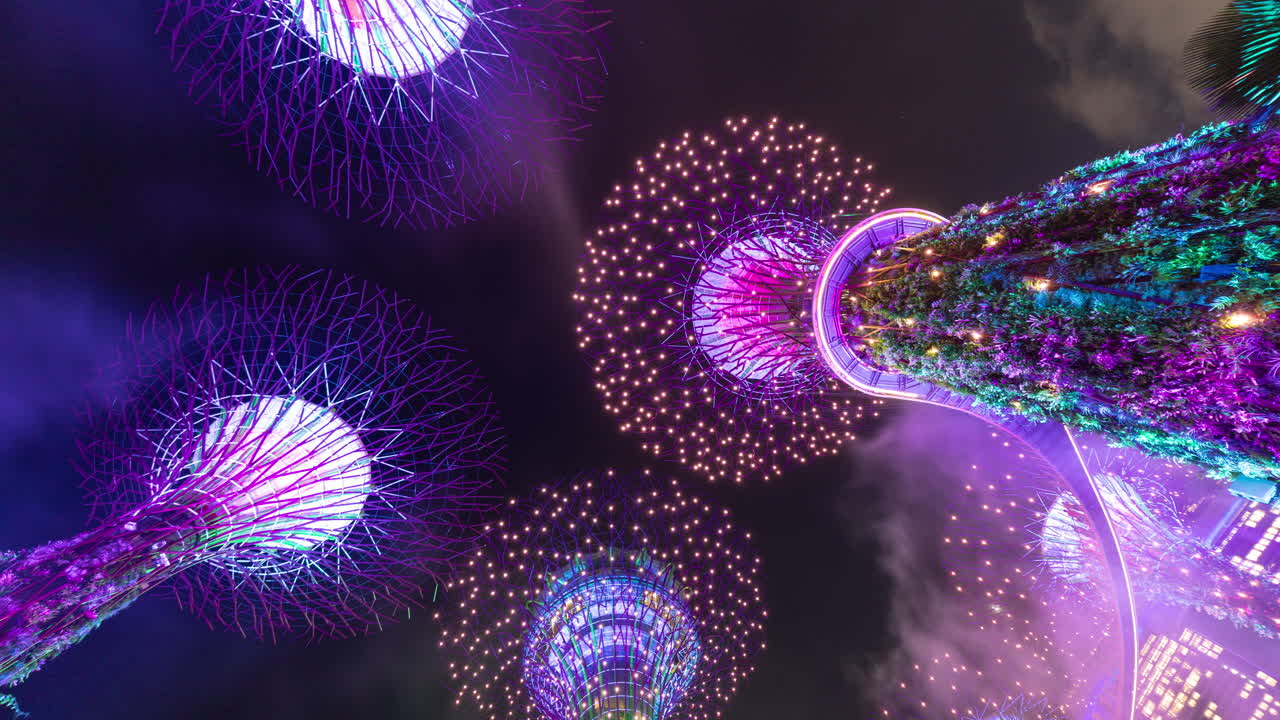 timelapse of the evening illuminated light show in the gardens by the bay in singapore