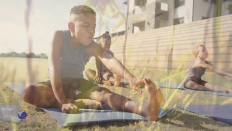 animation of sunlight and plants over happy diverse schoolchildren exercising outdoors