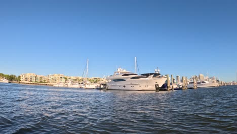 a yacht docked at a marina in gold coast